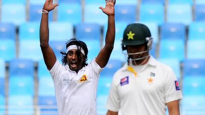 Nuwan Pradeep, left, made a successful comeback into the Sri Lanka side in Dubai on Wednesday. Ishara S Kodikara / AFP