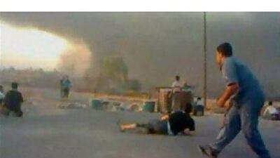 Activists in Hama come under attack from government forces on Sunday, but say they will not allow a repeat of 1982's crackdown. YouTube via Reuters