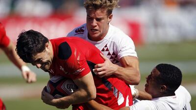 England coach Simon Amor acknowledges it will not be easy for his team, in white, and Wales to compete against each other in Dubai this week. Nikhil Monteiro / Reuters