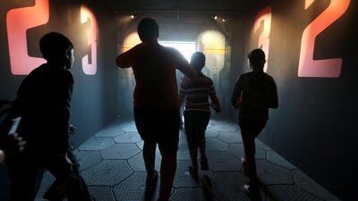 Children take part in the 'space station activity' during the opening day of the Abu Dhabi Science Festival. Christopher Pike / The National