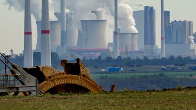 Steam rises from chimneys of a coal-fired power station in Germany. AP