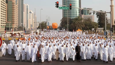 Sheikh Mohamed bin Zayed Al Nahyan Crown Prince of Abu Dhabi Deputy Supreme Commander of the UAE Armed Forces, and HH Sheikh Mohammed bin Rashid Al Maktoum, the Vice President and Prime Minister of the UAE and Ruler of Dubai, lead a parade during the Qasr???