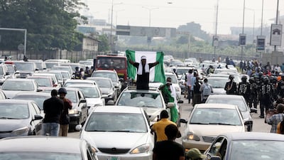 Cars lined up in a procession through the streets to mark the first anniversary of the EndSARS protest at the Lekki Toll Gate. Reuters