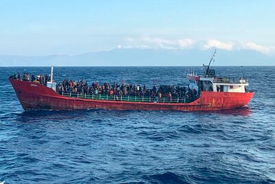 A ship with migrants near the southern island of Crete, Greece, on October 29, 2021. Hellenic Coast Guard via AP