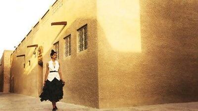 Vest, U-ni-ty; skirt, Ivan Grundahl, both at IF Boutique. Tights; belt, both stylist's own. Shoes, Christian Louboutin.