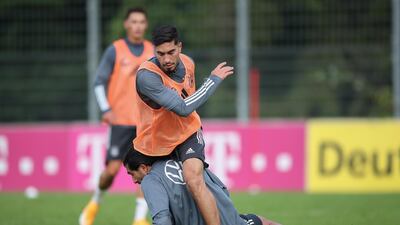 Emre Can tackles Suat Serdar during a training session at ADM-Sportpark ahead of Germany's Uefa Nations League group stage match against Spain. Getty Images