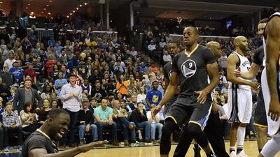 Draymond Green of the Golden State Warriors reacts after being fouled during the second half of a game against of the Memphis Grizzlies at FedExForum on April 9, 2016 in Memphis, Tennessee. Frederick Breedon/Getty Images/AFP