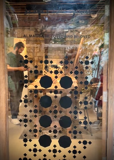 Saudi artist Ahmad Angawi works on an installation during Balad Al-Fann. Photo: Zawiya 97