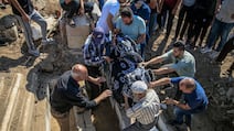 Relatives mourn members of the Al Masri family who were killed by an Israeli air strike in Gaza city on Tuesday. EPA