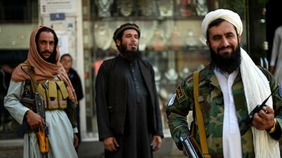 Taliban fighters stand guard. Photo: AFP