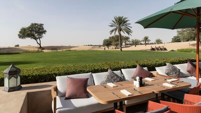 Outdoor dining at Zala comes with desert-filled vistas