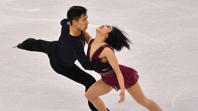 China's Sui Wenjing and Han Cong compete in the pair skating short program to K D Lang's cover of Hallelujah during the Pyeongchang 2018 Winter Olympic Games. AFP