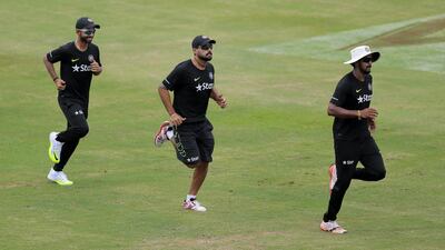 India's Murali Vijay, centre, has strained a hamstring that will keep him out of the first Test at Galle against Sri Lanka. Eranga Jayawardena / AP Photo