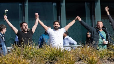 Mosque shooting survivors from left, Mustafa Boztas, Wassail Daragmih and Temel Atacocugu leave the Christchurch High Court after the sentencing hearing for Australian Brenton Harrison Tarrant, in Christchurch, New Zealand. AP Photo