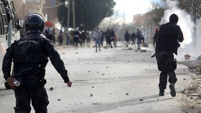 Riot police clash with protesters during demonstrations. Reuters
