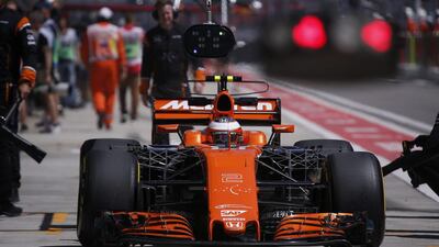 McLaren Honda driver Stoffel Vandoorne of Belgium arrives at the garage. Engine failures have made he and Fernando Alonso spectators over much of the Formula One calendar so far this season. Reuters