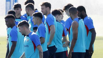 Barcelona's players take part in training. EPA