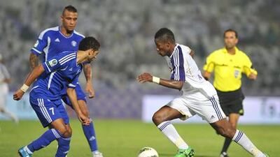 Asamoah Gyan, right, in action for Al Ain against Al Nasr.
