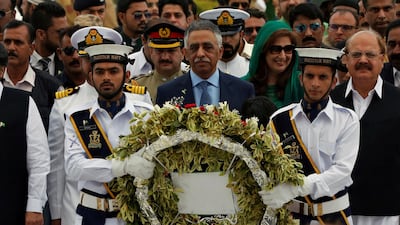 Mohammad Zubair Umar (C), Governor of Sindh province walks with Pakistan's naval officers to lay a wreath during a ceremony to celebrate the country's 70th Independence Day at the mausoleum of Muhammad Ali Jinnah in Karachi, Pakistan August 14, 2017. REUTERS/Akhtar Soomro