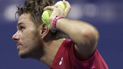 Stan Wawrinka, of Switzerland, prepares to hit balls into the crowd after defeating Kei Nishikori, of Japan, during the semi-finals of the US Open on Friday, September 9, 2016, in New York. Charles Krupa / AP Photo