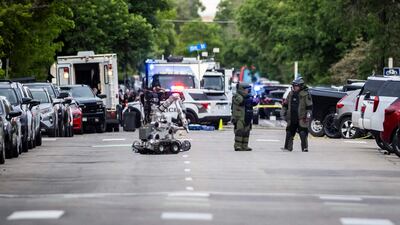 Bomb squads set up a staging area in the city. AFP