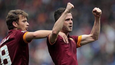 Miralem Pjanic celebrates scoring aginast Napoli on April 4. Riccardo Antimiani / EPA