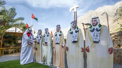 Saeed Aldharoobi prepares for UAE National Day.