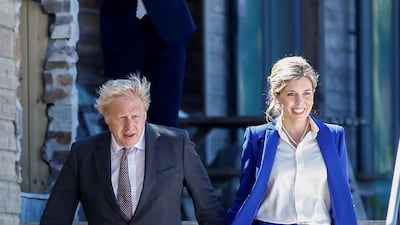 Carrie Johnson, wife of British Prime Minister Boris Johnson, wears a rented suit by Amanda Wakeley. Getty Images