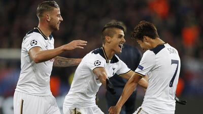 Tottenham’s Son Heung-min celebrates scoring their first goal with Erik Lamela and Toby Alderweireld. John Sibley / Reuters