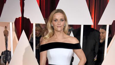 2015: Reese Witherspoon keeps things classic in a monochrome Tom Ford gown at the 87th Annual Academy Awards. AFP