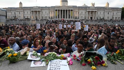 Supporters leave flowers after a vigil for late University of Cambridge professor, Jason Arday, in Trafalgar Square, London, following his death aged 41 on August 14. AFP