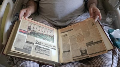 Portraits of the retired cricketer, Mohammad Ishaq, in his home.