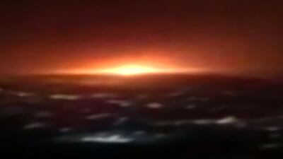 An image grab from Iranian State TV footage shows the glow from what the country's defence ministry said was the explosion of a gas tank near the capital Tehran on June 26, 2020. IRIB via AFP