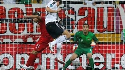 Germany's Mario Gomez scores the only goal to beat Portugal at the New Lviv stadium. Eddie Keogh / Reuters