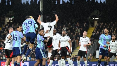 Arsenal's Kai Havertz heads the ball down for teammate William Saliba who levelled the scores in the 52nd minute. AFP