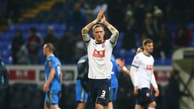 Dean Moxey of Bolton Wanderers applauds the supporters after Tuesday night's FA Cup replay against Eastleigh. Alex Livesey / Getty Images