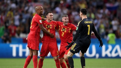 Vincent Kompany, Thomas Vermaelen and Toby Alderweireld celebrate with goalkeeper Thibaut Courtois. The defensive trio are all over 30 and this may be their last chance to win the World Cup. Getty Images