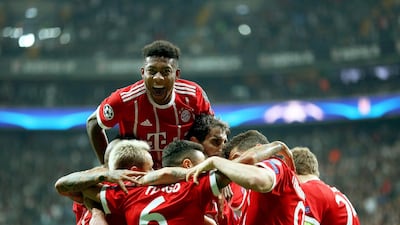 Bayern Munich players celebrate Thiago Alcantara's opening goal as the German team went on to beat Besiktas 3-1. Erdem Sahin / EPA