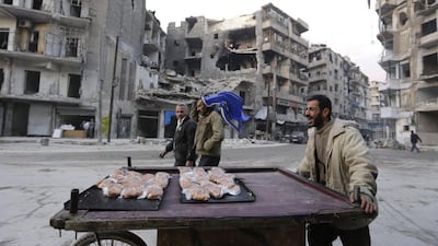 A man sells croissants in Al Shaar.