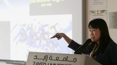 Former Japanese astronaut Naoko Yamazaki shares her experiences in space at the Zayed University convention centre in Abu Dhabi on Sunday. Pawan Singh / The National
