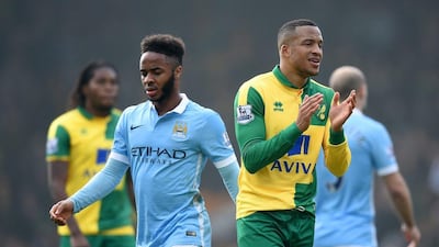 Martin Olsson of Norwich City applauds while Raheem Sterling of Manchester City shows his frustration after the scoreless draw in the Premier League match between Norwich City and Manchester City at Carrow Road on March 12, 2016 in Norwich, England. (Photo by Michael Regan/Getty Images)