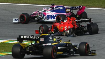 Sebastian Vettel of Ferrari loses his tyre during the Brazilian Formula One Grand Prix after his collision with teammate Charles Leclerc. EPA
