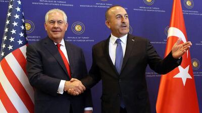 US secretary of state Rex Tillerson shakes hands with Turkish foreign minister Mevlut Cavusoglu in Ankara on March 30, 2017. Adem Altan / AFP
