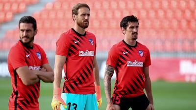From left: Koke, goalkeeper Jan Oblak, and Stefan Savic.
