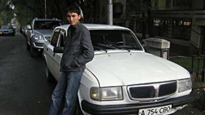 Azamat Sazgascaev with his Russian-built 1997 Volga in Kazakhstan.