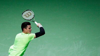Milos Raonic of Canada plays a shot to Andrey Kuznetsov of Russia during their match at the Rotterdam Open on Tuesday. Dean Mouhtaropoulos / Getty Images / February 10, 2015