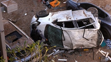 Vehicles damaged by an Iranian missile attack on Tel Aviv. Bloomberg