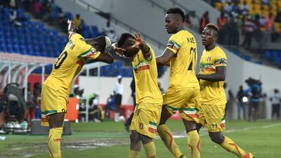 Mali's midfielder Yves Bissouma, celebrates with teammates after scoring against Uganda in Oyem on January 25, 2017. Issouf Sanogo / AFP