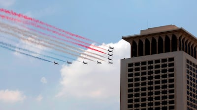 Egyptian jet fighters fly over the capital Cairo. Government is considering adding more state-owned companies to the list of firms in which investors can get majority stakes. AFP