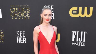 US actress Kathryn Newton in a red plunging Valentino gown. AFP